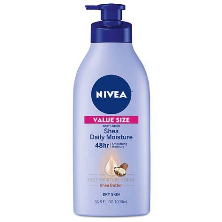 A pump bottle of shea moisture coconut and hibiscus conditioner for curly hair