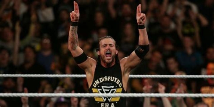 Adam Cole Bay Bay pose