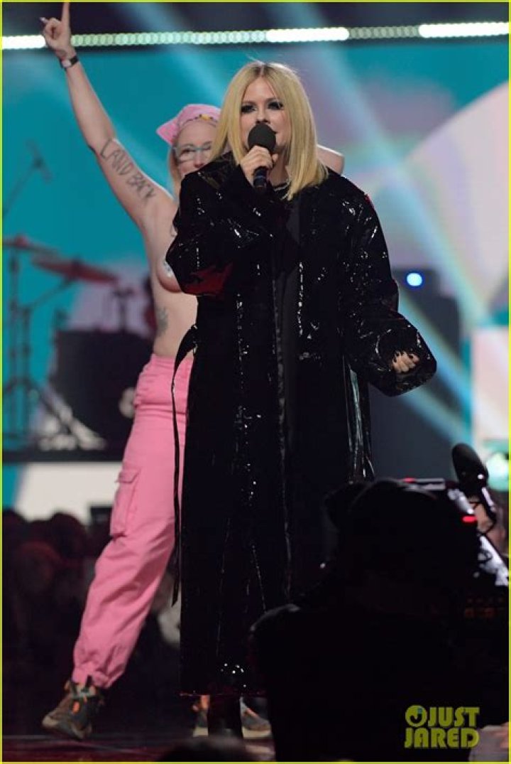 Avril Lavigne Confronts Topless Protester at Juno Awards, and The Weeknd Becomes Second Most-Awarded Artist