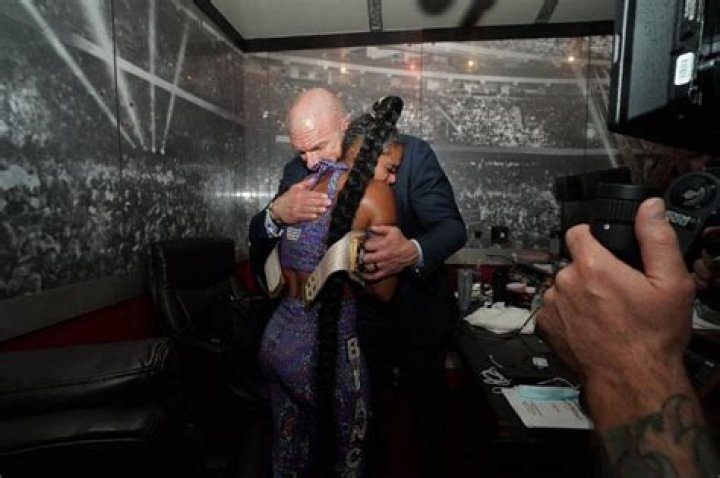 Bianca is hugging HHH