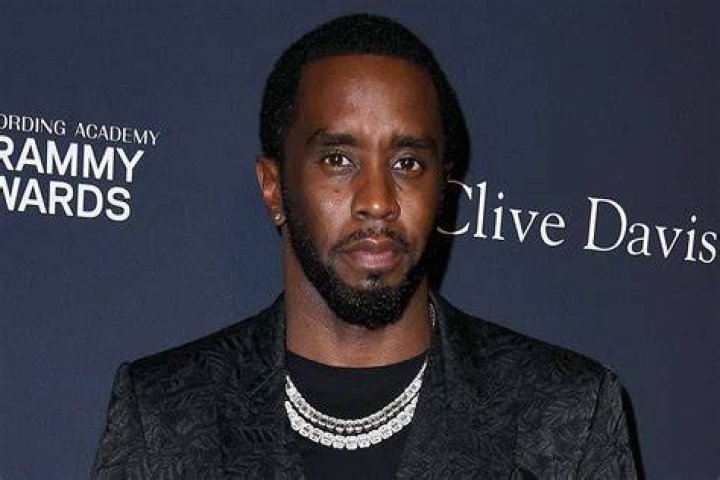 Diddy Is All Smiles in Rare Photo With All 7 Kids Parade