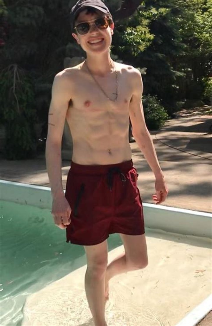 Elliot Page Shows off Summer Body in Swim Trunks