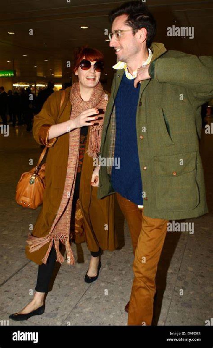 Florence Welch and her boyfriend have the look of love without the urge