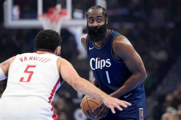 James Harden (C), winner of the 20172018 MVP award, poses with his mom