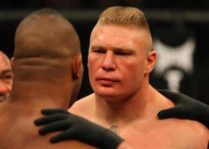 Mixed martial artist Brock Lesnar poses on the scale during his weigh-in for UFC 200 at T-Mobile Arena on July 8, 2016 in Las Vegas, Nevada. (Photo by Ethan Miller/Getty Images)