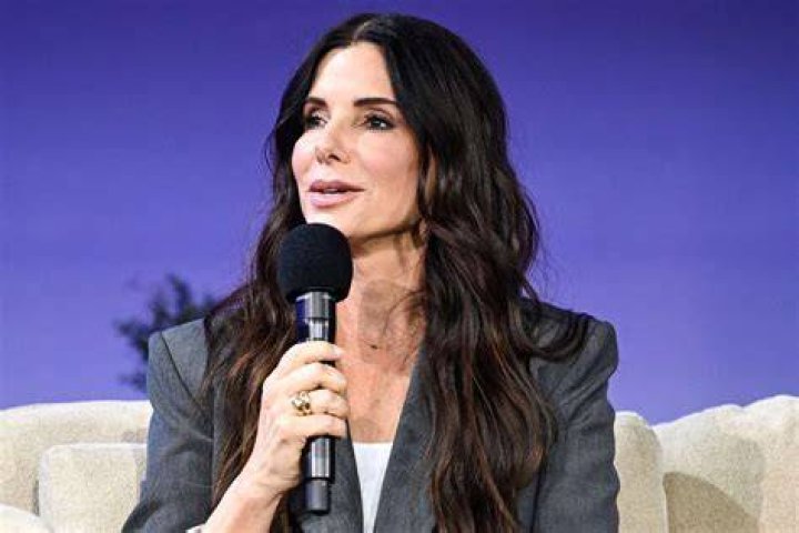 People Sandra Bullock saves first sitdown for pal Lopez The