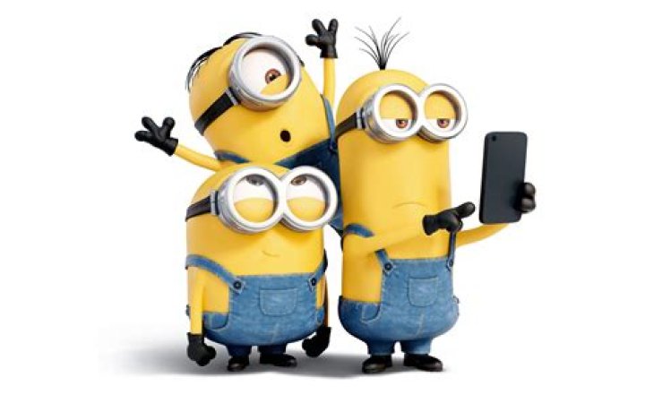 Three crazy minions make a selfie Funny cartoon characters Wallpaper