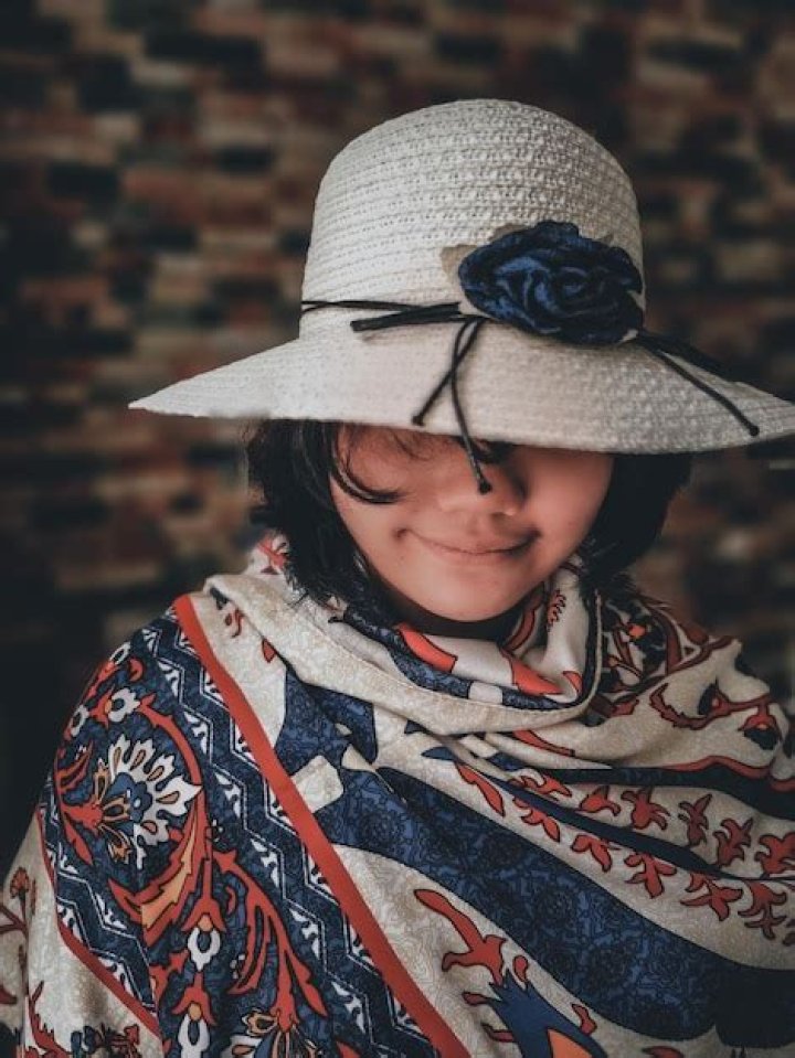 young girl in face scarf
